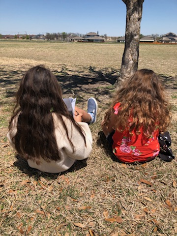 A beautiful day calls for reading outdoors! #OurFES 🦅