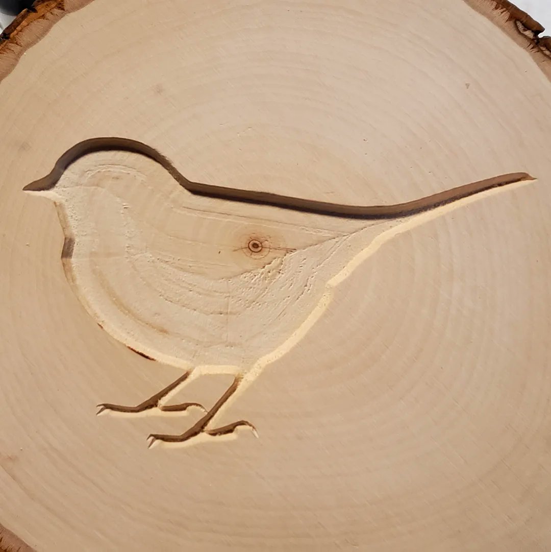 BitSizedBuilds's tweet photo. Before-the-paint photo of a wooden-round we are working on! #wood #carving #cnc #bird #finch #crafts https://t.co/daKLd61fAF