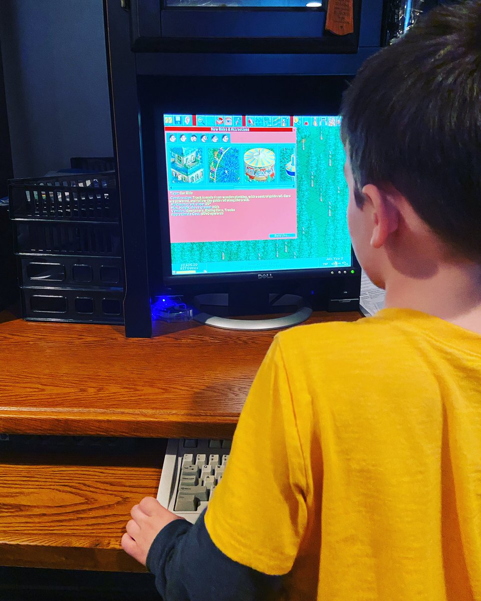RetroTechorDie's tweet photo. RollerCoster Tycoon with my son. #rollercoastertycoon #windows95 #ibmmodelm https://t.co/SsxbBcVftG