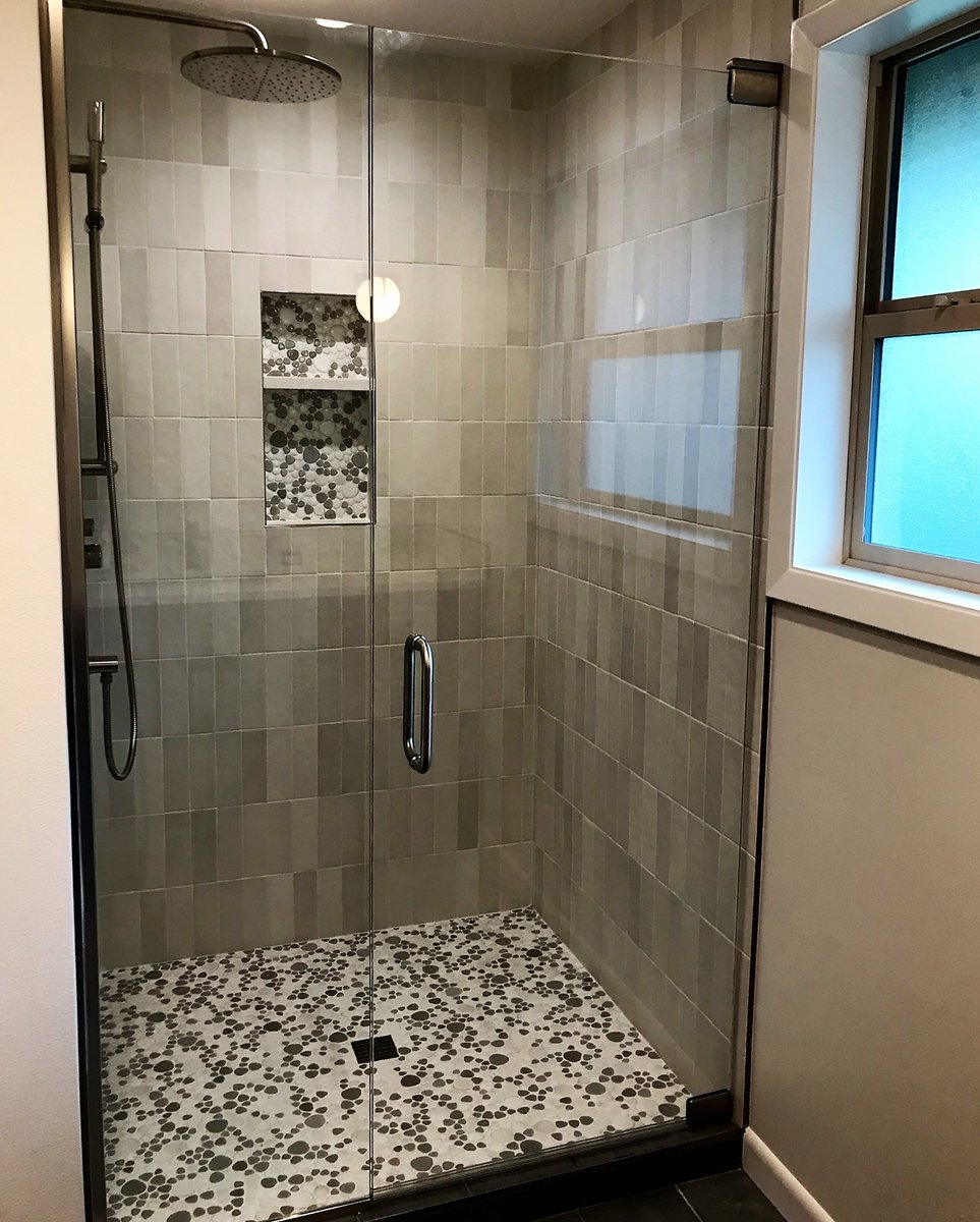 Another shower door installed! We love adding the icing on the cake to a bathroom remodel with our shower glass. #aaakartakinstalls #fasterandbettersince1956 #aaakartak #showerenclosures #showerdesign #showerglass #showerdoors #bathroomdesign