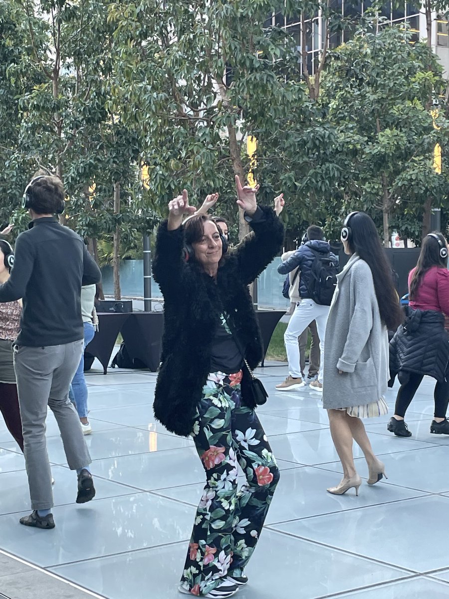 JenniferNorris2's tweet photo. Moving to the grooves at the #BloomSF Silent Disco ⁦@TransitCenterSF⁩ 
Loving how many people dressed for the floral theme. 
Checkout the many remaining events this weekend at https://t.co/OAKrCjUVp8 https://t.co/TiKUyDuEv9