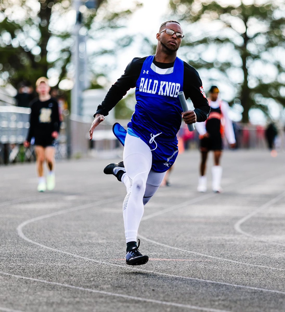 baldknobschools's tweet photo. The Bulldogs picked up a win in an exciting 4X200 meter relay when senior Marcus McGahee ran down his fellow last-leg competitor to ensure the Bulldogs' victory in the event.

#bksyearbook22
#prideachievementintegrity https://t.co/Nn4rbDDRvp