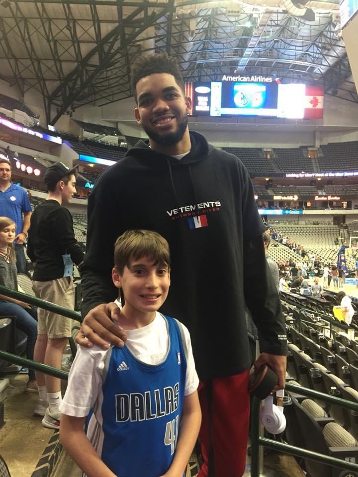 jxcook2's tweet photo. Looking back 3 years ago. @KarlTowns  was awesome taking a few minutes after a game in Dallas to take this pic with my son.  Just as nice as he is tall. https://t.co/rSBXeb1Raq