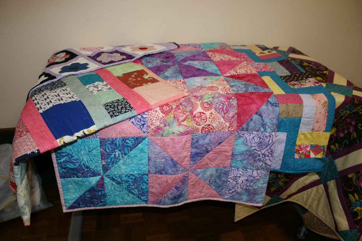 stfrancislincs's tweet photo. Janette from #LinusProject recently visited school, bringing in some of the most gorgeous Quilts made by volunteers. These are just some of the quilts that were very kindly donated to us. Thank you so much to all the ladies that have made them!! https://t.co/rxU6FhehmC