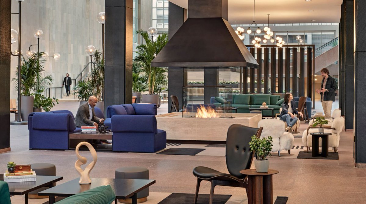 Design studio <a href="/marchandwhite/">MAWD</a> have transformed the interiors of an IM Pei tower in Denver, Colorado. Influenced by the mid-century architecture of the original design, the project includes a communal fireplace with travertine accents. Read more via <a href="/dezeen/">Dezeen</a> 
bit.ly/3J5kst2