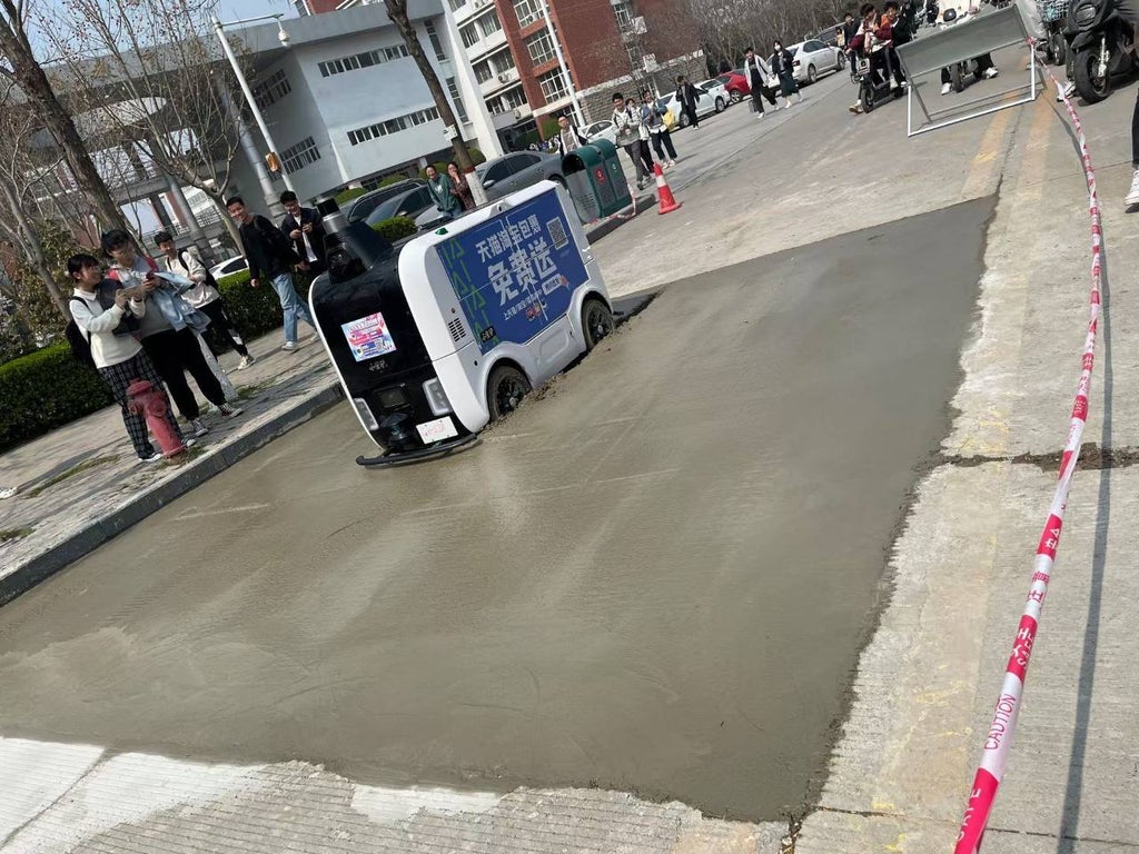 WeeklyRobotics's tweet photo. Any tips how to make autonomous robots detect fresh cement?

#robotics #autonomouscars #ai #fail

Image source: https://t.co/hJA54uNczu https://t.co/DsNnoyttkW