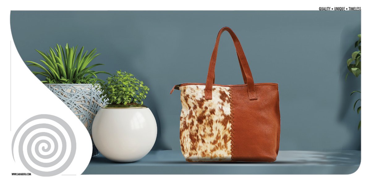 Sanabora's tweet photo. A combination of two independent colours and textures gives a luxurious, modern and chic feel on this Ngiro cow leather bag.For orders call: +254705186691  #madeinkenya #leathertote #handmadegifts #uniqueluxury  #uniquebag #leather #buylocal #shopsmall #SupportSmallBusinesses https://t.co/gb688K3Naw