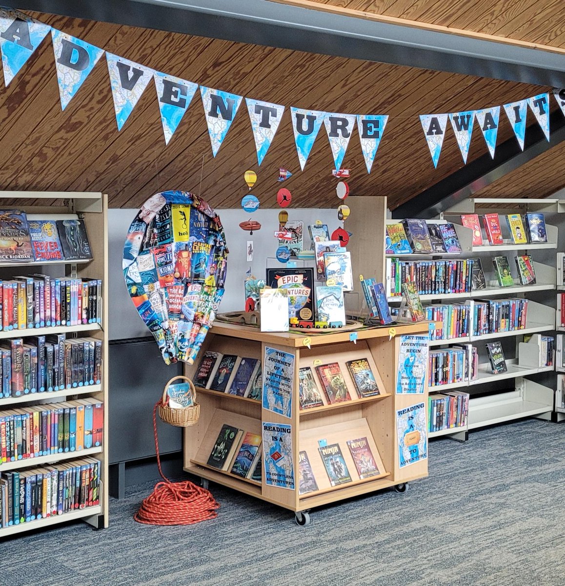 lvslrc's tweet photo. Where will you go this Easter? There are plenty of epic adventures you don't have to leave the house for @lvslrc @lvsascot Seek out the red spot on a book's spine where adventure awaits. #readingforpleasure #adventurers ✈🌍🚆🎒🎟🧭📖🔴 https://t.co/agaFAX1g79