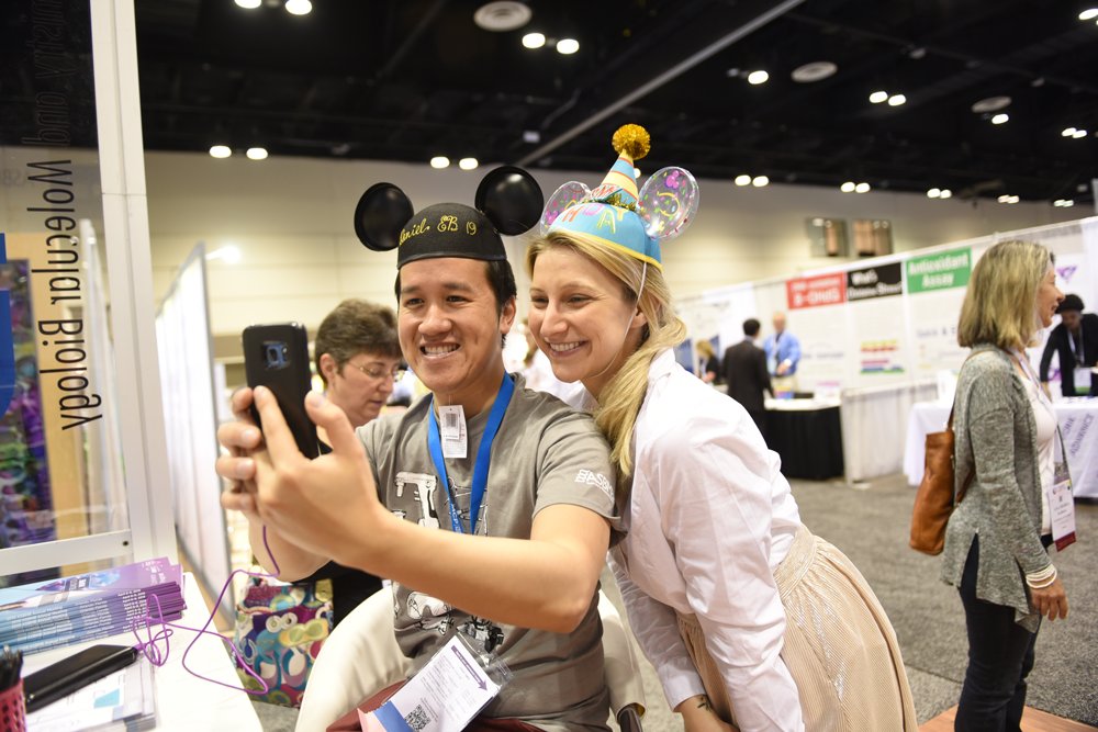 ASBMB's tweet photo. #ExpBioThrowback: Even staffers have a ball at @expbio. Here’s @ASBMB multimedia maven @allisonfrick and then-policy team member @dpham20 being goofy (in Mickey ears) in Orlando in 2019.
https://t.co/owfJCginAm #ASBMB2022 https://t.co/1kc5hjW1Ap