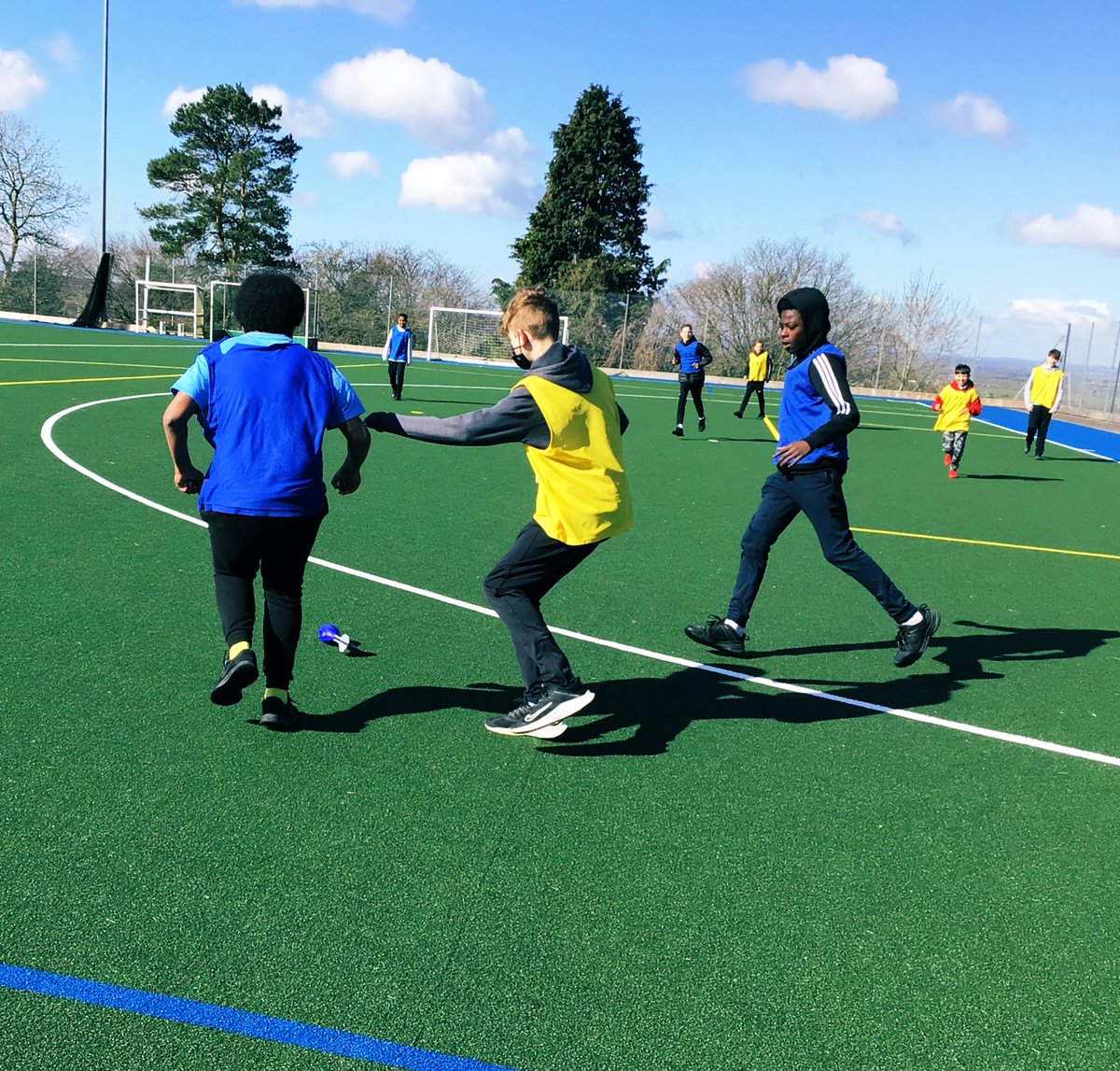 RWBAPEDept's tweet photo. Our work to represent and champion the Ukraine 🇺🇦 continues today. Even our Astro surface honours the flag colours. Year 8 exploring positioning in their invasion unit of work today #SupportUkraine #StandWithUkriane #PEpower @RWBAcademy @RWBAHolocaust https://t.co/WjJQijD3vn