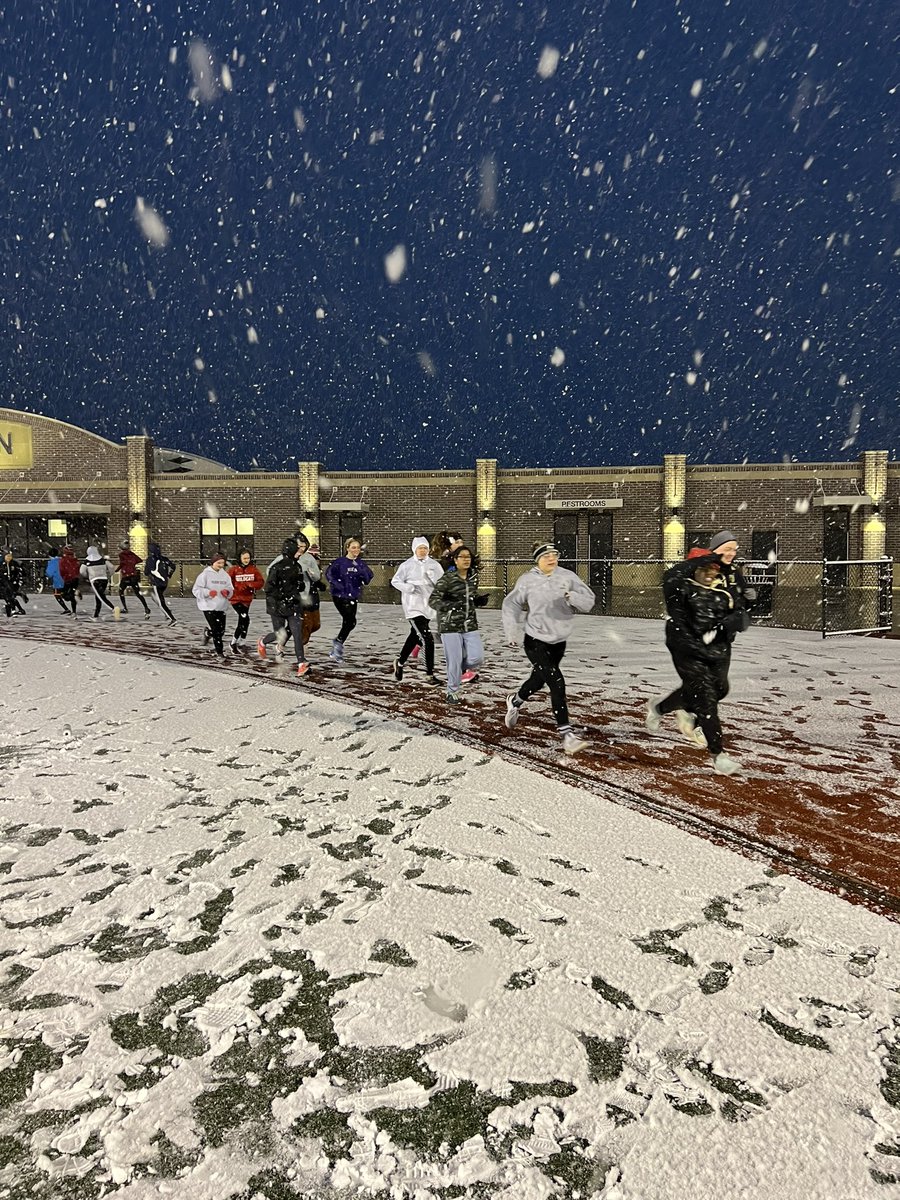 Early morning track practice before Spring Break .. April Fools .. it’s SNOWING!?