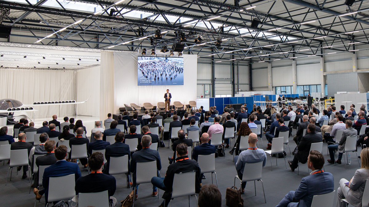 Lilium's tweet photo. Yesterday at our first annual supplier day we welcomed over 150 guests from 70+ suppliers to our HQ in Munich. We delved into the Lilium mission and how together, with their support we will start building our first conforming aircraft. A few highlights...#Lilium #eVTOL https://t.co/CW7UpthpxW