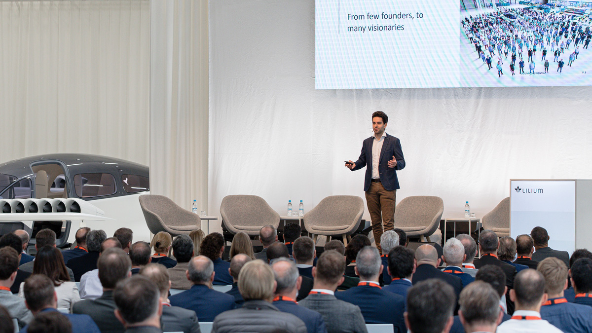 Lilium's tweet photo. Yesterday at our first annual supplier day we welcomed over 150 guests from 70+ suppliers to our HQ in Munich. We delved into the Lilium mission and how together, with their support we will start building our first conforming aircraft. A few highlights...#Lilium #eVTOL https://t.co/CW7UpthpxW
