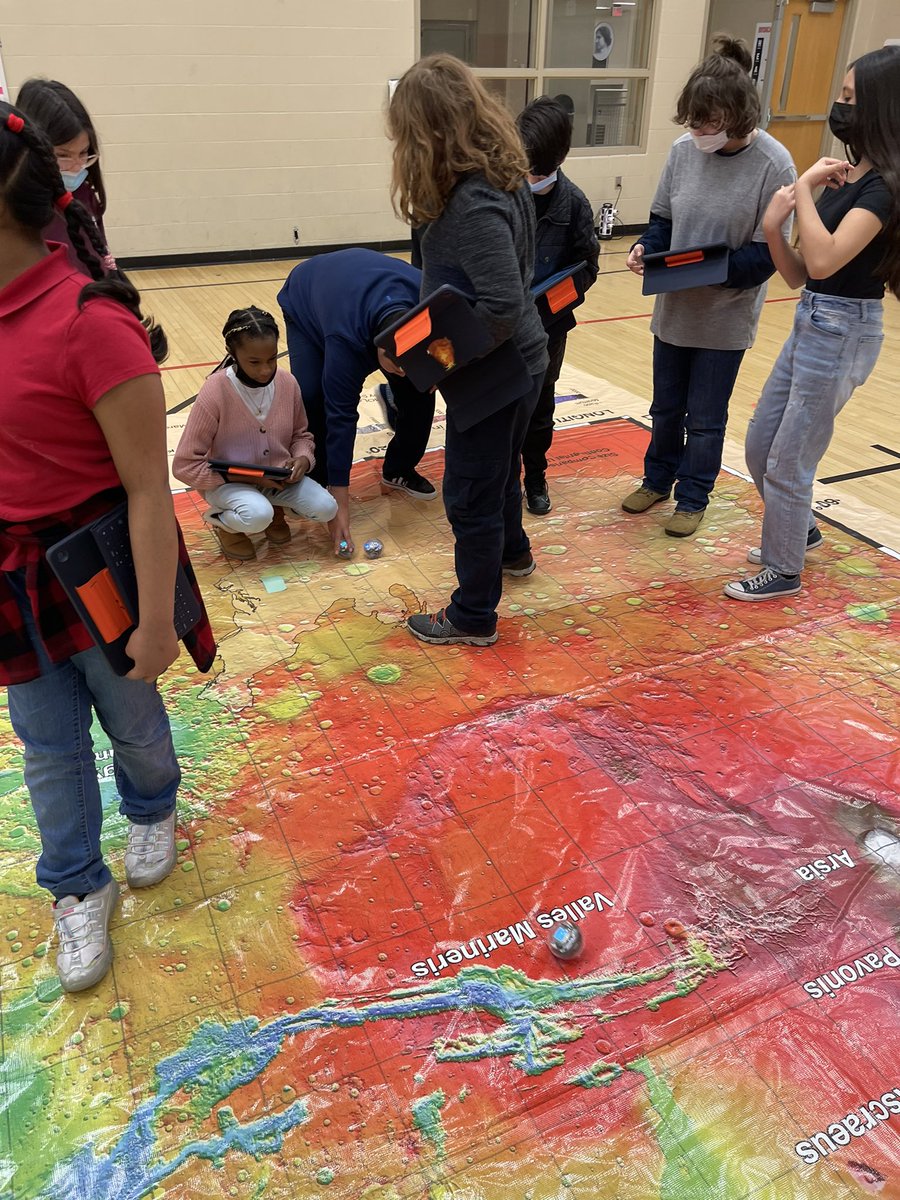 ScottSTEM5's tweet photo. The best project of the year! Working together with Mr. Kauffman’s class to create a Mars rover that is coded to stop at different locations on the Mars map! https://t.co/icr3mbSlCv