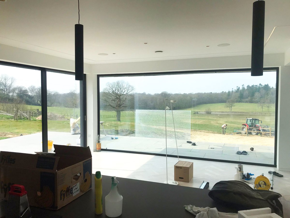 glassinmotion's tweet photo. One of our projects from last year is making progress. Some huge triple-glazed #Solarlux #Cero #SlimSlidingDoors and fixed panels, and an amazing #frontdoor. #tripleglazing #selfbuild #granddesigns https://t.co/xrMym7PtSd