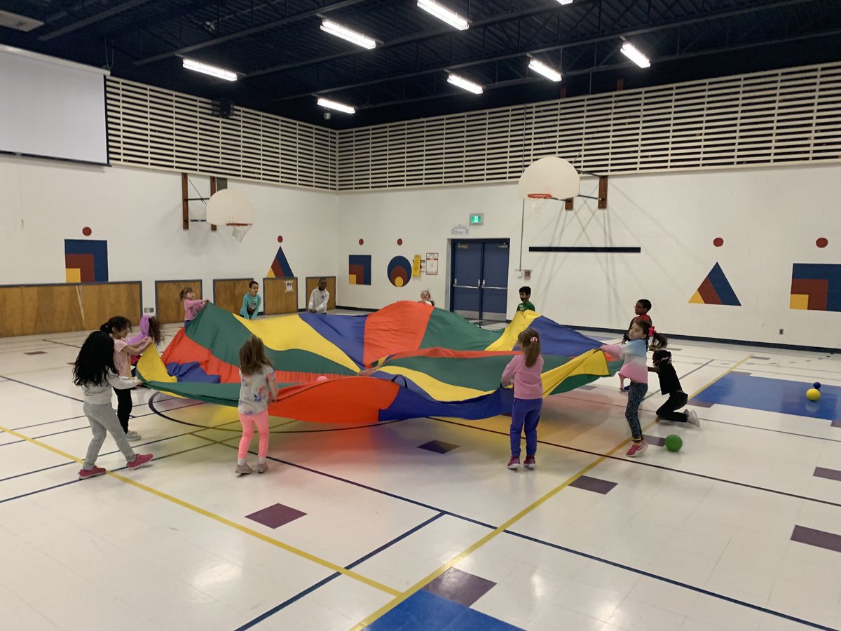 Remember being in Grade 1 and the teacher pulled out the parachute! Happy students! Happy Friday! ⁦<a href="/OLWisdomOCSB/">Our Lady of Wisdom School</a>⁩