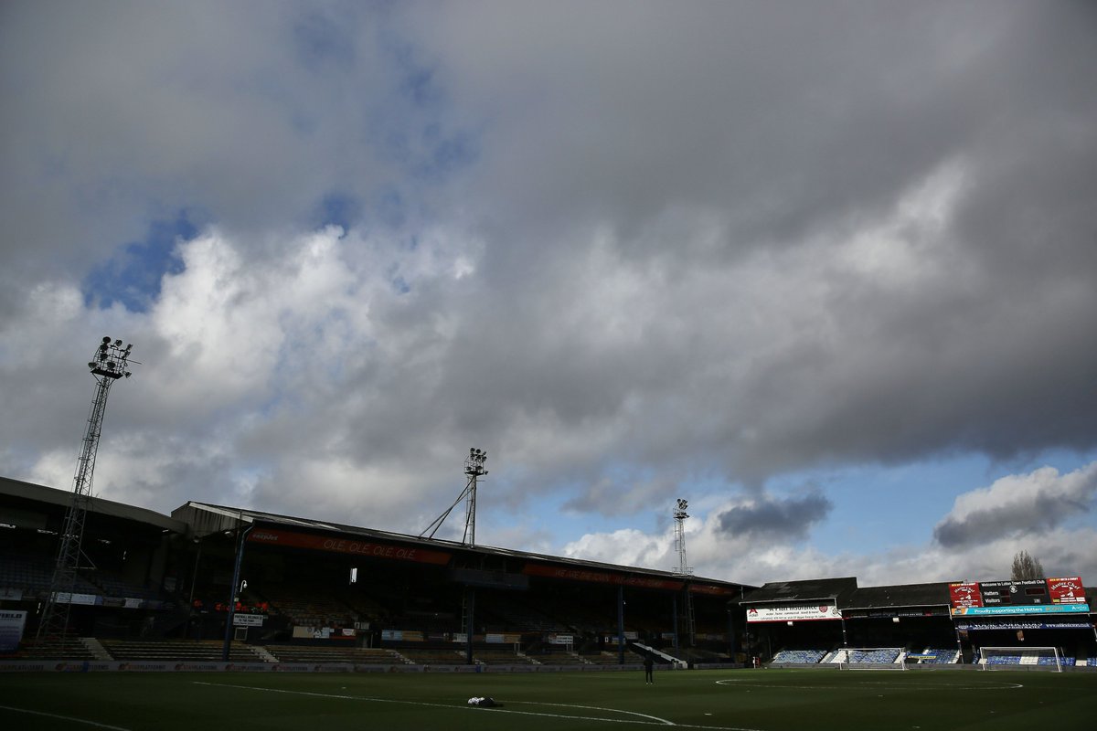 LutonTown's tweet photo. Norman's Caribbean hut will not be open for tomorrow's match following the recent passing of his mother, Kathrine. 

Our thoughts go out to Norman at this time 🧡 https://t.co/f86SI8cl1U