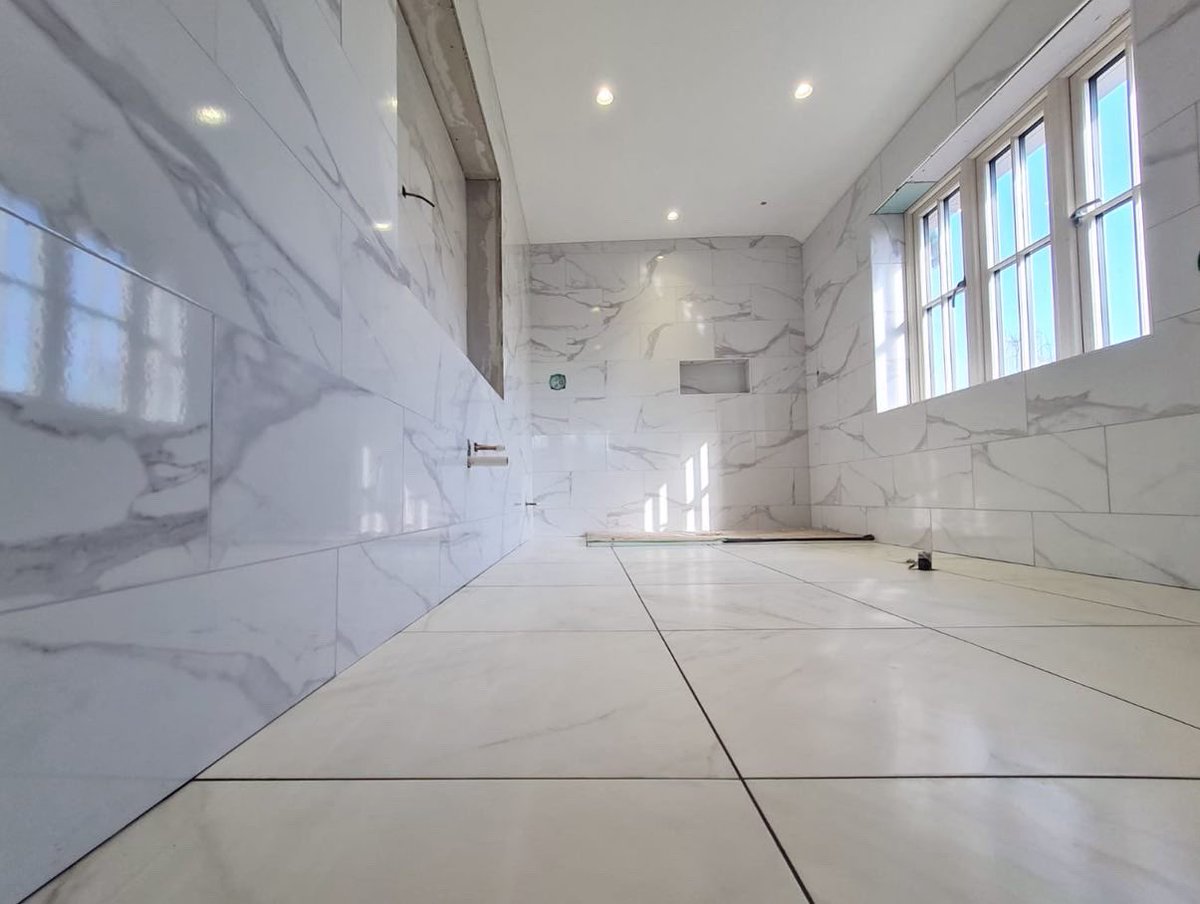 Marble is having its moment! We recently completed two beautiful bathrooms installing marble effect porcelain tiles for a customer in Camberley.