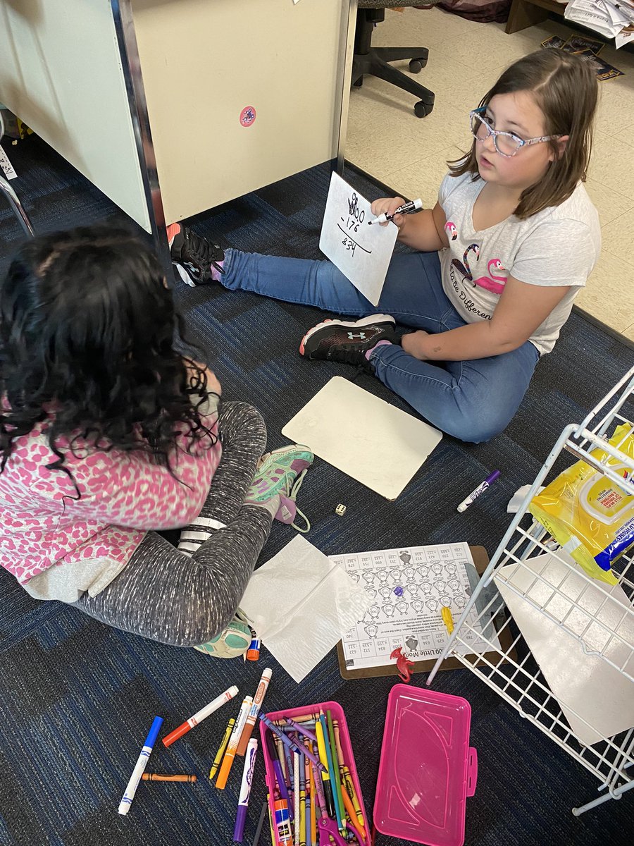 Friday Fun Math! 1000 Little Monsters Game.  Students had to work in pairs and move around the board and solve 3 digit addition and subtraction problems. Student with the most monsters wins.