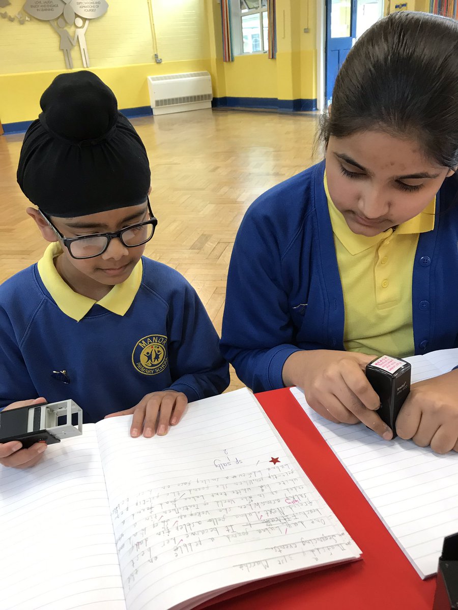 ManorPrimarySch's tweet photo. Pupil leaders in Year 2 working collaboratively with pupil leaders in Year 6 to look at presentation and handwriting in English books. Well done Year 2! #workproud #exceptionality https://t.co/NDMWHuS3WM