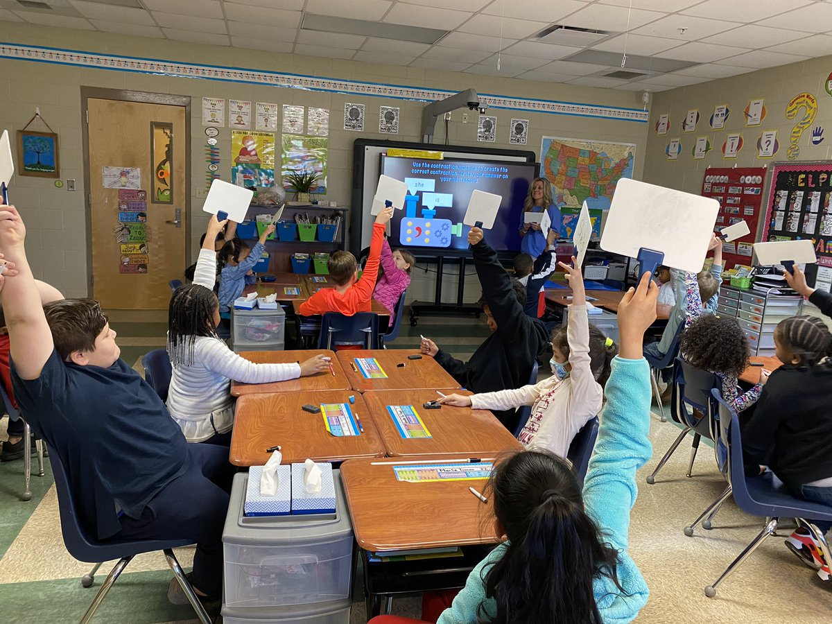 E_Sheninger's tweet photo. Something as simple as using individual whiteboards can empower students through voice. This second grade class at Corinth Elementary was throughougjly immersed in a lesson on contractions cc @CorinthSchools #disruptivethink https://t.co/10IkvdhMio