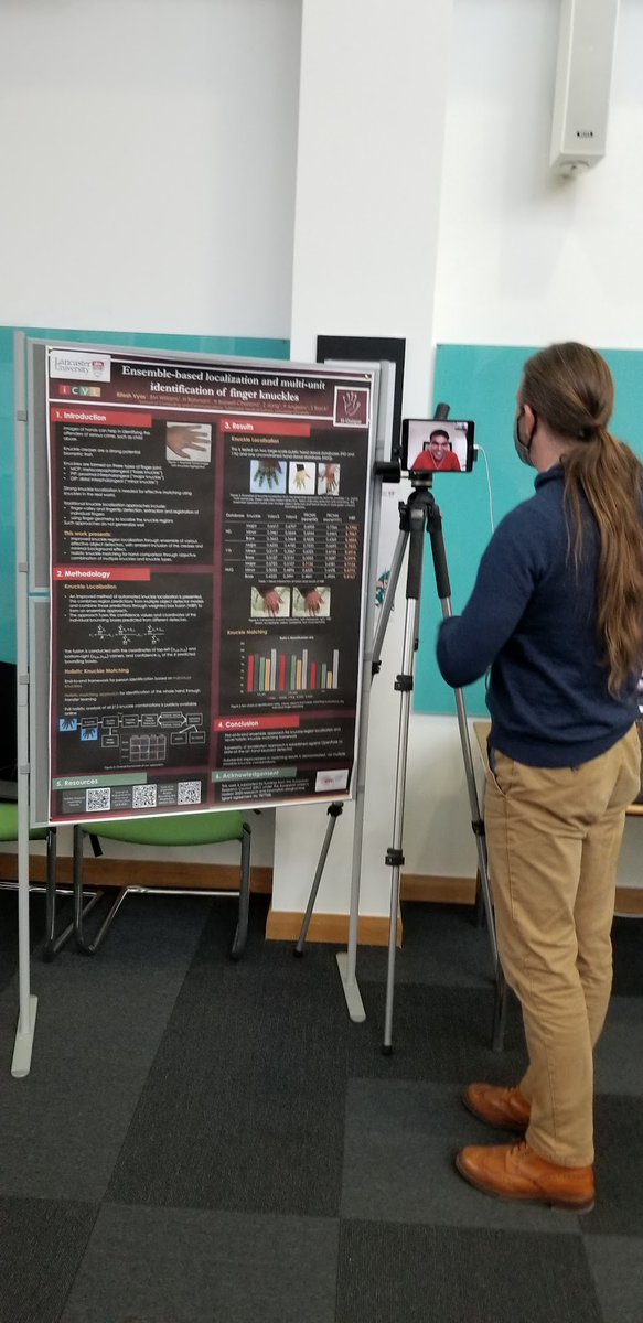 HUniqueProject's tweet photo. Our new take on a hybrid conference. @vyasritesh157 skyping in from New Delhi to discuss his poster on effective feature localisation and holistic knuckle crease matching for @HUniqueProject at @LancasterUni's #LUScienceWeek22. https://t.co/CUPQdivfr9