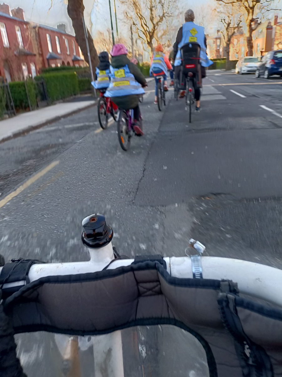 D7CycleBus's tweet photo. Back out on the @D7CycleBus today in solidarity with the @D12BikeBus
As we cycled along we acknowledged how lucky we are in D7 to have the filtered scheme in Grangegorman. We need safe cycling infrastructure everywhere, now! #BikeBusIsProtest https://t.co/LYSmqsx66j