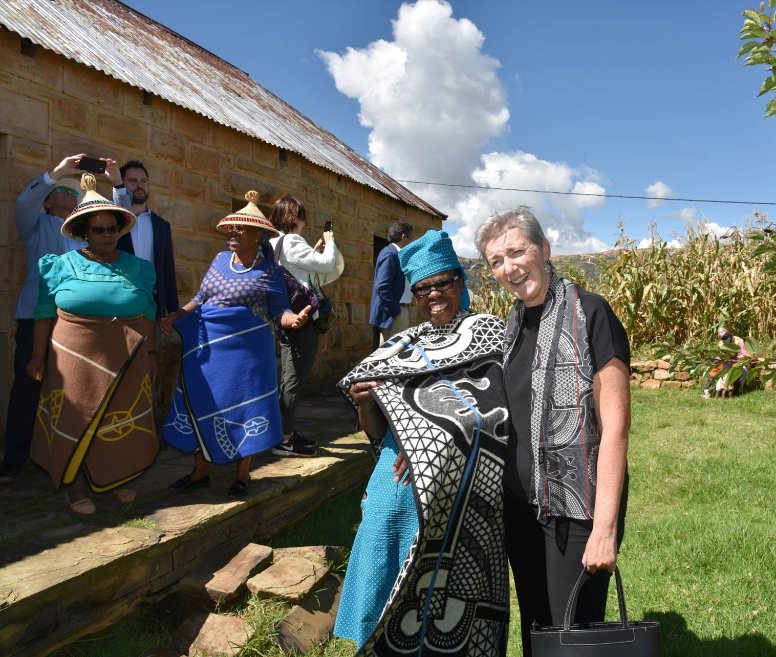 EUinLesotho's tweet photo. The blanket of this Makaneng lady and my scarf have the same pattern - an occasion for a picture - PA #Lstwitter #WearLocalFriday https://t.co/io7OXCG0su