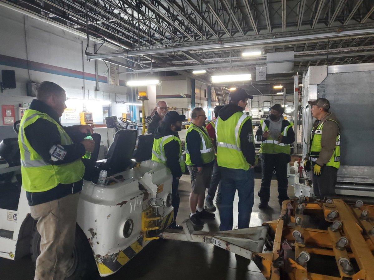 DFW_SunriseRamp's tweet photo. Brining dolly pinch points and tongue awareness to the front door activity! CHSP Jet representative Tom Lein demonstrates safety for new hire and vets alike! @DfwUps @UpsDfwTraining @UPSers @RedRiverUPSers https://t.co/PenP4drUhV
