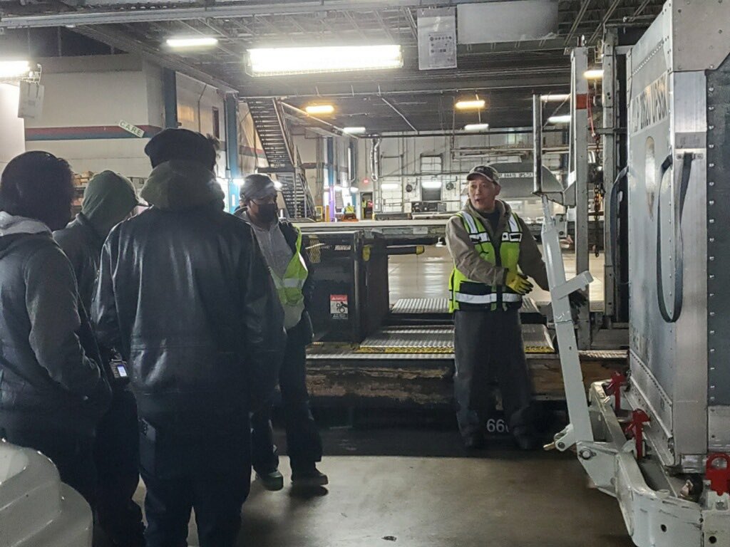 DFW_SunriseRamp's tweet photo. Brining dolly pinch points and tongue awareness to the front door activity! CHSP Jet representative Tom Lein demonstrates safety for new hire and vets alike! @DfwUps @UpsDfwTraining @UPSers @RedRiverUPSers https://t.co/PenP4drUhV