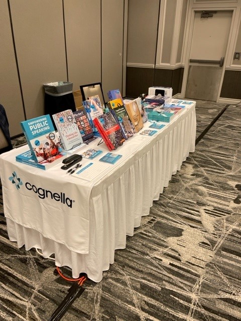 Cognella's tweet photo. Be sure to stop by our booth in the exhibit hall at #CSCA22 today! Publisher Todd Armstrong is on site with our new and notable #communicationstudies titles. https://t.co/x7RVUyu8ny