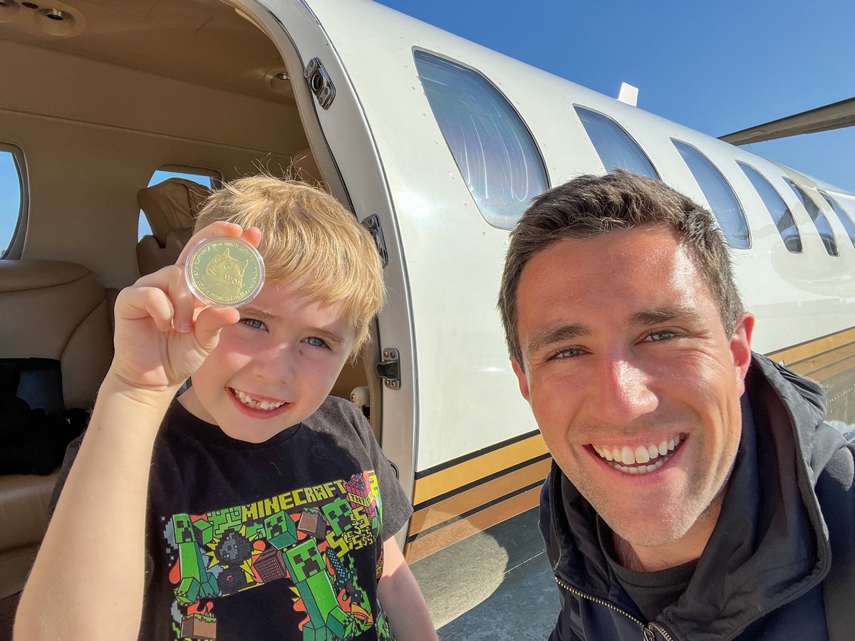 realMeetKevin's tweet photo. Just landed in Palo Alto and got Jack his first #Dogecoin! https://t.co/6ZzC0nkn5h