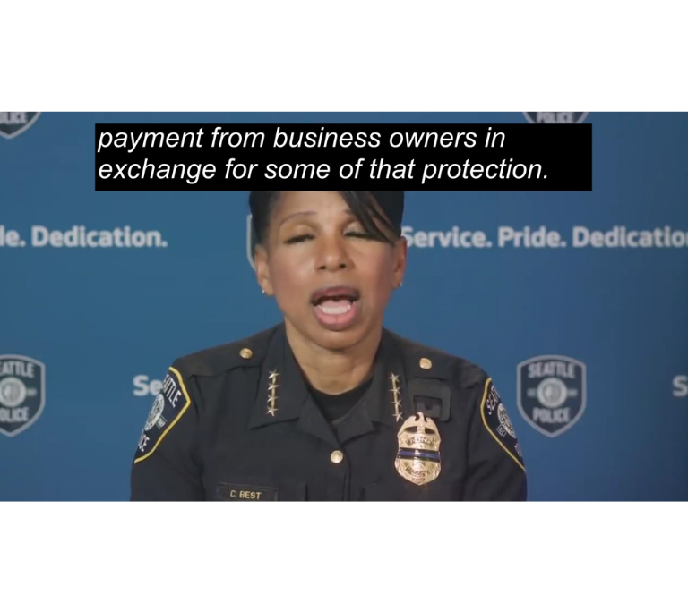 Woman in a Police Uniform in front of a blue background that contains the SPD logo and motto "Service. Pride. Dedication. Captions, white text on a black box: "We have also received reports that some of these armed people are demanding payment from business owners in exchange for protection."