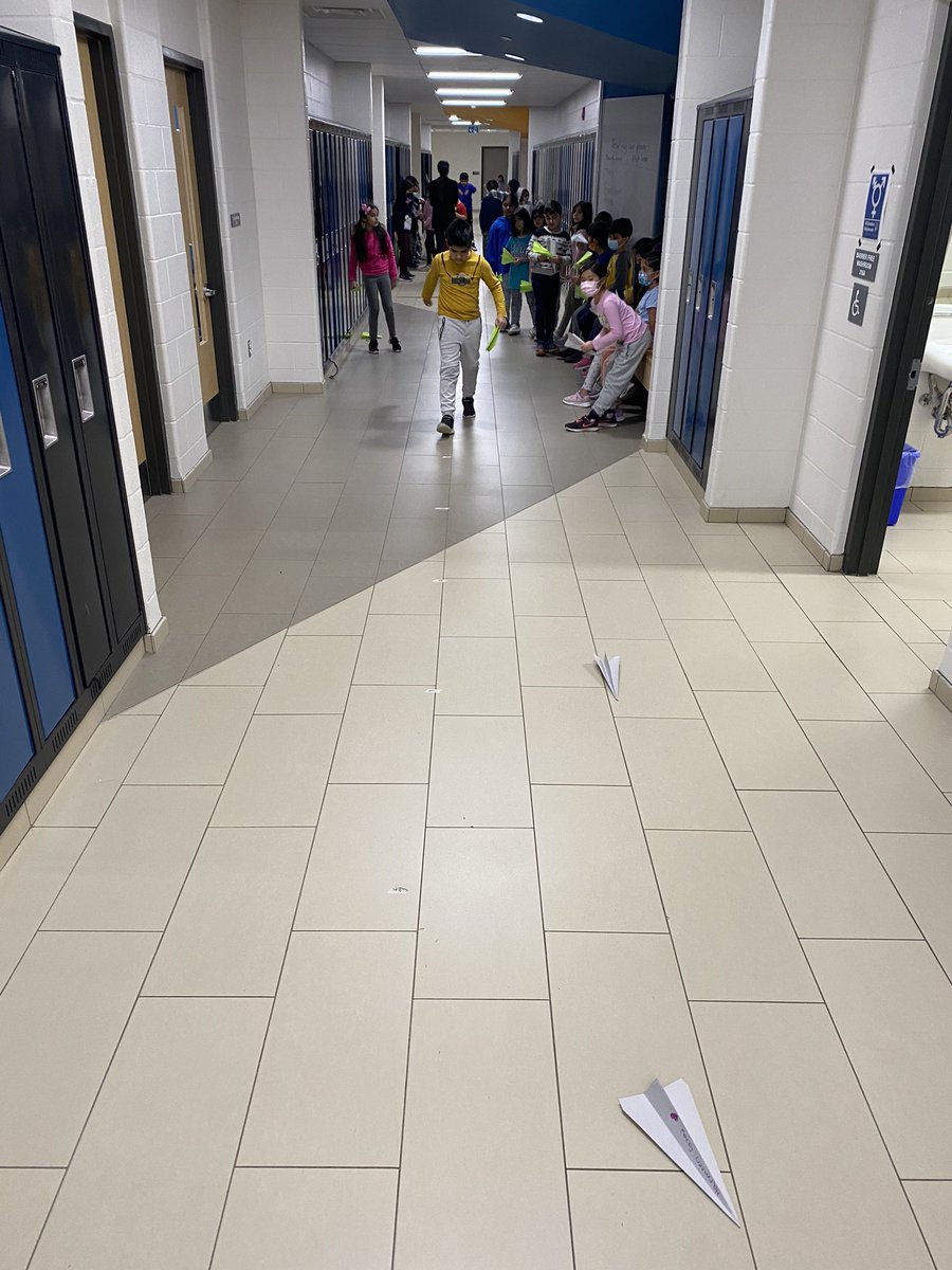 nieuwpoortj's tweet photo. The Grade 2’s &amp; 3’s did some math &amp; science today. We made 2 different paper airplanes and tested how far each plane could go (measured in meters) we had some fly further than 8 meters. @DesmondHDSB @RyanHDSB @MsThorogood https://t.co/xz4xmSei0K