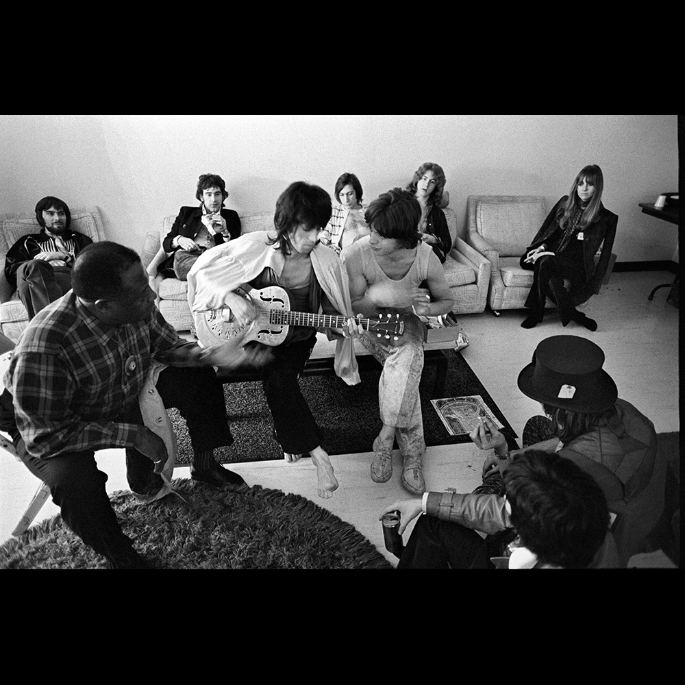 ethan_russell's tweet photo. Bukka White - legenday blues man. (Parchman Farm) backstage at #therollingstones 1969 concert. L to R: #glynjohns #bukkawhite unknown #keithrichards #charlieswatts #mickjagger #micktaylor #astridlundstrom back to camera: #stanleybooth #grahamparsons https://t.co/97bQmAMJse