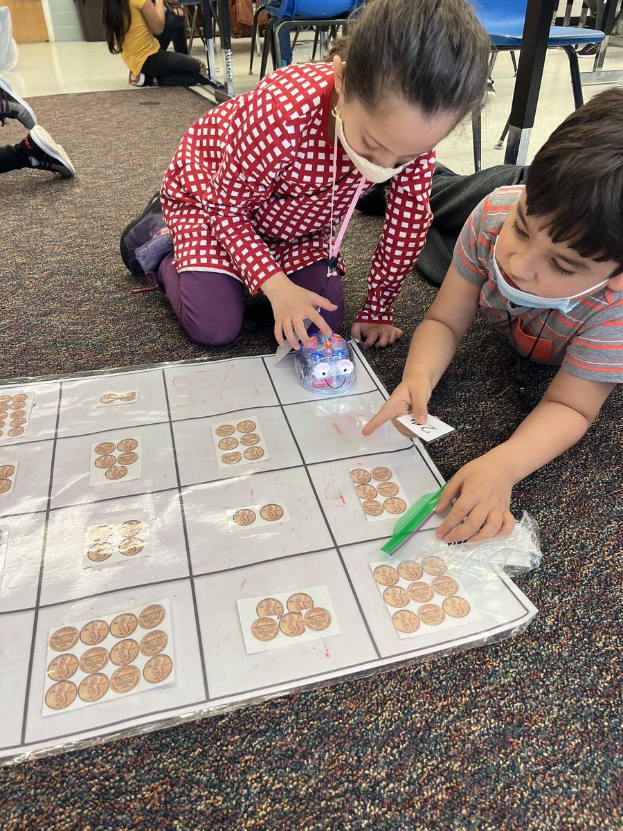 madswall1st's tweet photo. Bee Bots are FUN! We have been integrating our bee bots in our coin unit. Students match the cent cards to the coin collection and have to program their bot to the answer. #SullyElementary https://t.co/V6k2J1rsXY