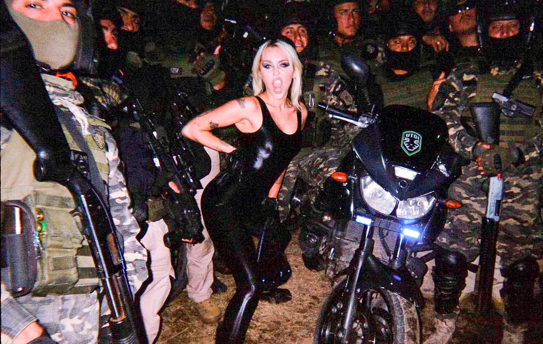 Miley Cyrus with Argentina police team is simply iconic