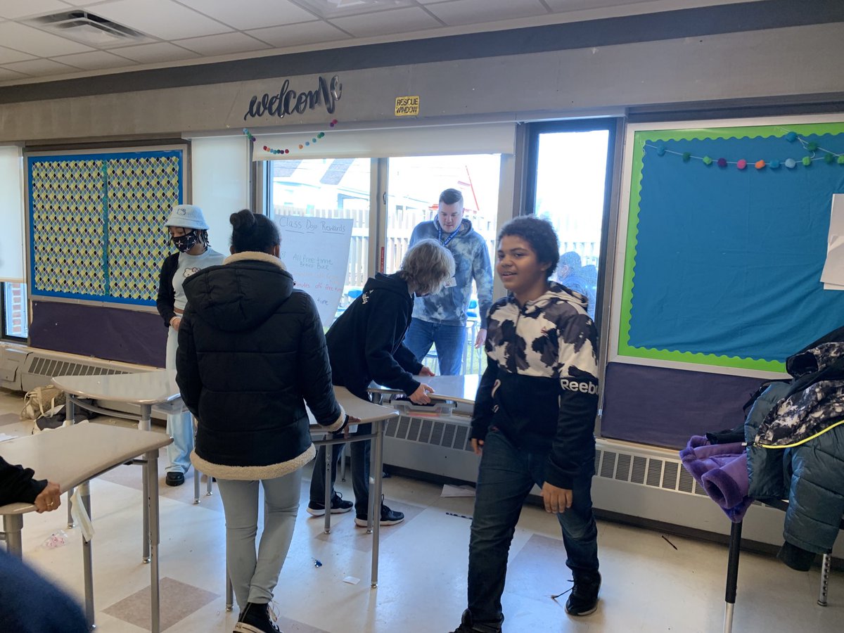 KMunrett's tweet photo. When your neighbor tapes all your students’ desks and chairs together, you wait until they have art and rearrange their furniture in the courtyard! April Fool’s Day at the end of ELAs should be mandatory! https://t.co/yfAtt37LYX