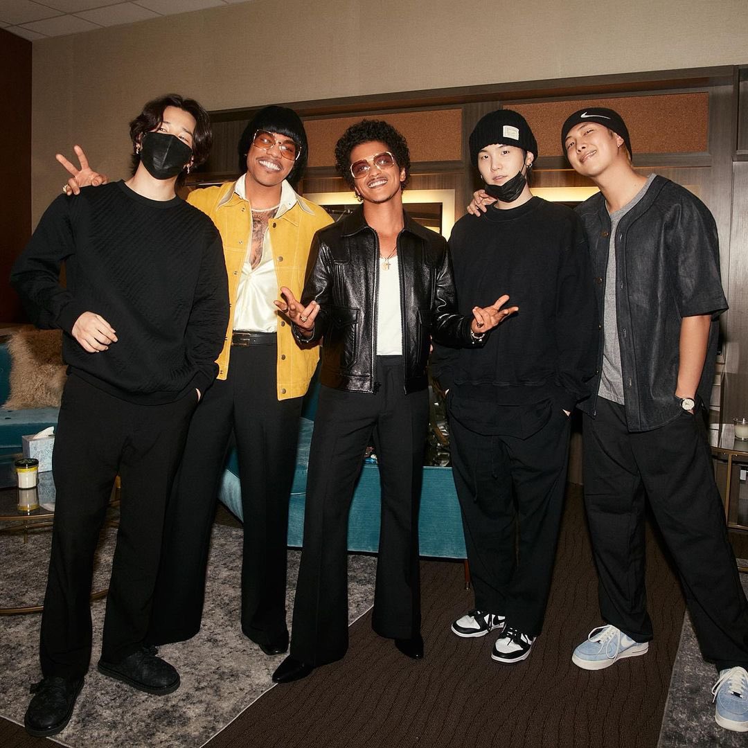 Jimin, Suga, and RM of BTS with Bruno Mars and Anderson Paak at Silk Sonic’s concert in Las Vegas.