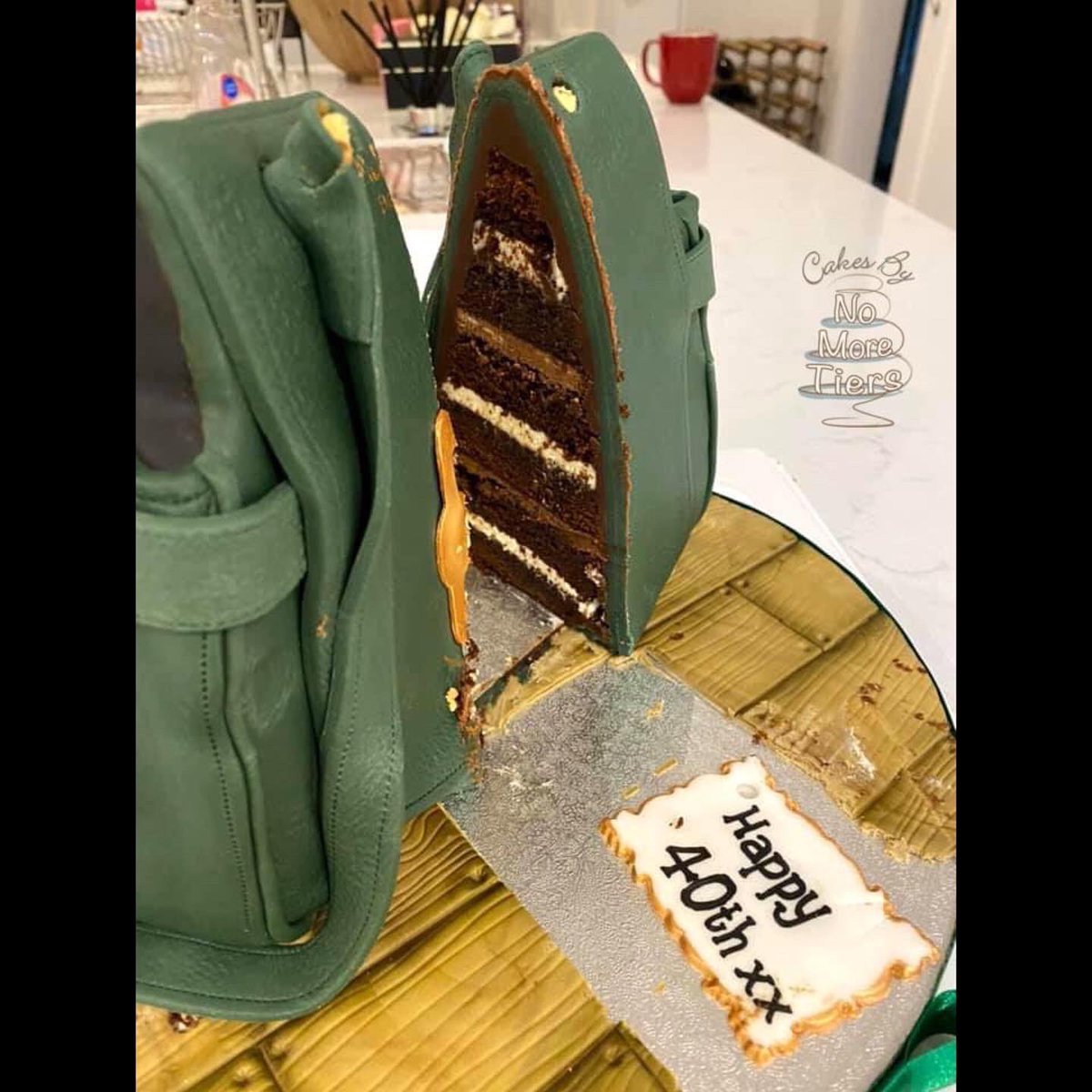 No_More_Tiers's tweet photo. So, was this a handbag or was it cake?
Of course it was cake! Multilayered rich chocolate cake to be precise. Here’s the proof of the cut cake.
One of my absolute favourite makes.
#Cake #isitcake #yesitscake #York #AprilFool https://t.co/SH25m0PDYD