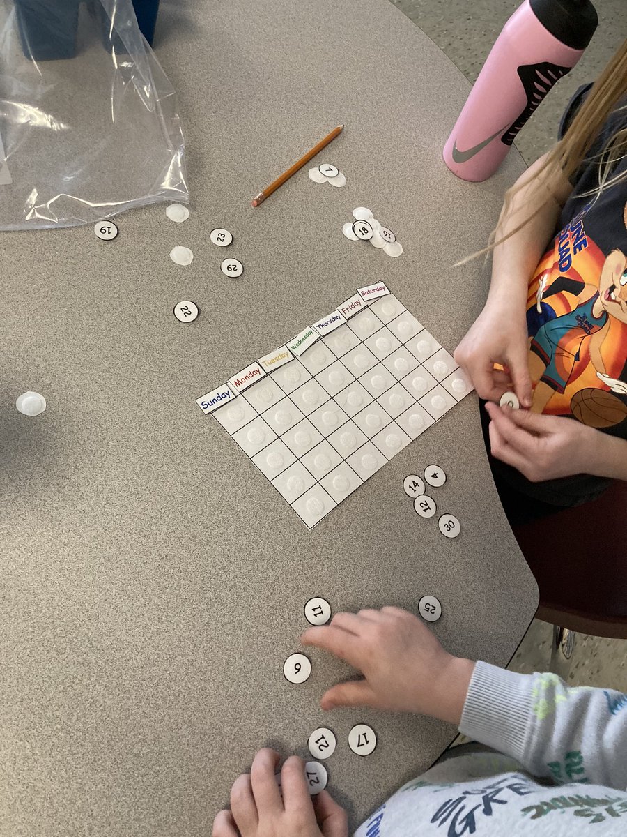 TeachMsMolloy's tweet photo. Each month we assemble our calendar and many number sense concepts emerge. “🐶 eats twice a day. How many meals will she eat this month?” One S counted by 2s; another thought of 2x30; and another counted by 10 every multiple of 5 @cedarhollowps #thehollow https://t.co/CDJ677QJZO