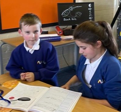 DeltaStrand's tweet photo. The Yr1 children went upstairs to see Yr 5/6, they shared their ideas on a new invention they had written about. It was lovely to hear Yr1 promoting their magic pan and enticing the older children to buy it! @DeltaStrand @Talk4Writing #DeltaStrandWriting @PieCorbett #LoveToRead https://t.co/3DXWQjh5IY