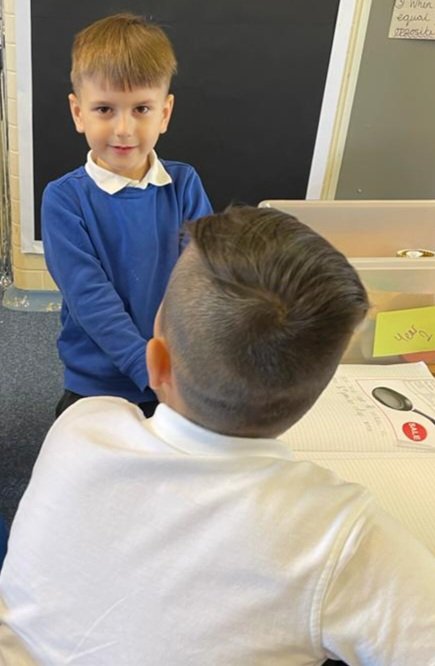 DeltaStrand's tweet photo. The Yr1 children went upstairs to see Yr 5/6, they shared their ideas on a new invention they had written about. It was lovely to hear Yr1 promoting their magic pan and enticing the older children to buy it! @DeltaStrand @Talk4Writing #DeltaStrandWriting @PieCorbett #LoveToRead https://t.co/3DXWQjh5IY