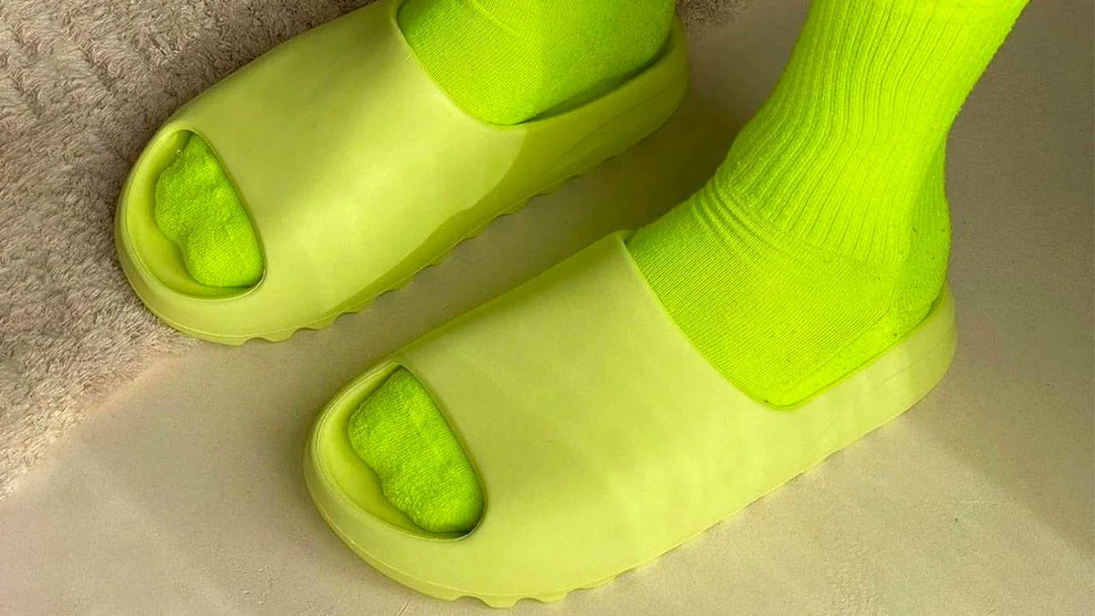 yeezy slide glow green on feet