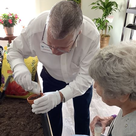 🌱 Wickshire Fort Myers welcomed the spring season with the grand opening of their beautiful garden room! Residents, associates, and community members celebrated their beautiful new space with finger foods, champagne, and planted seeds that will grow this summer. #WickshireWay