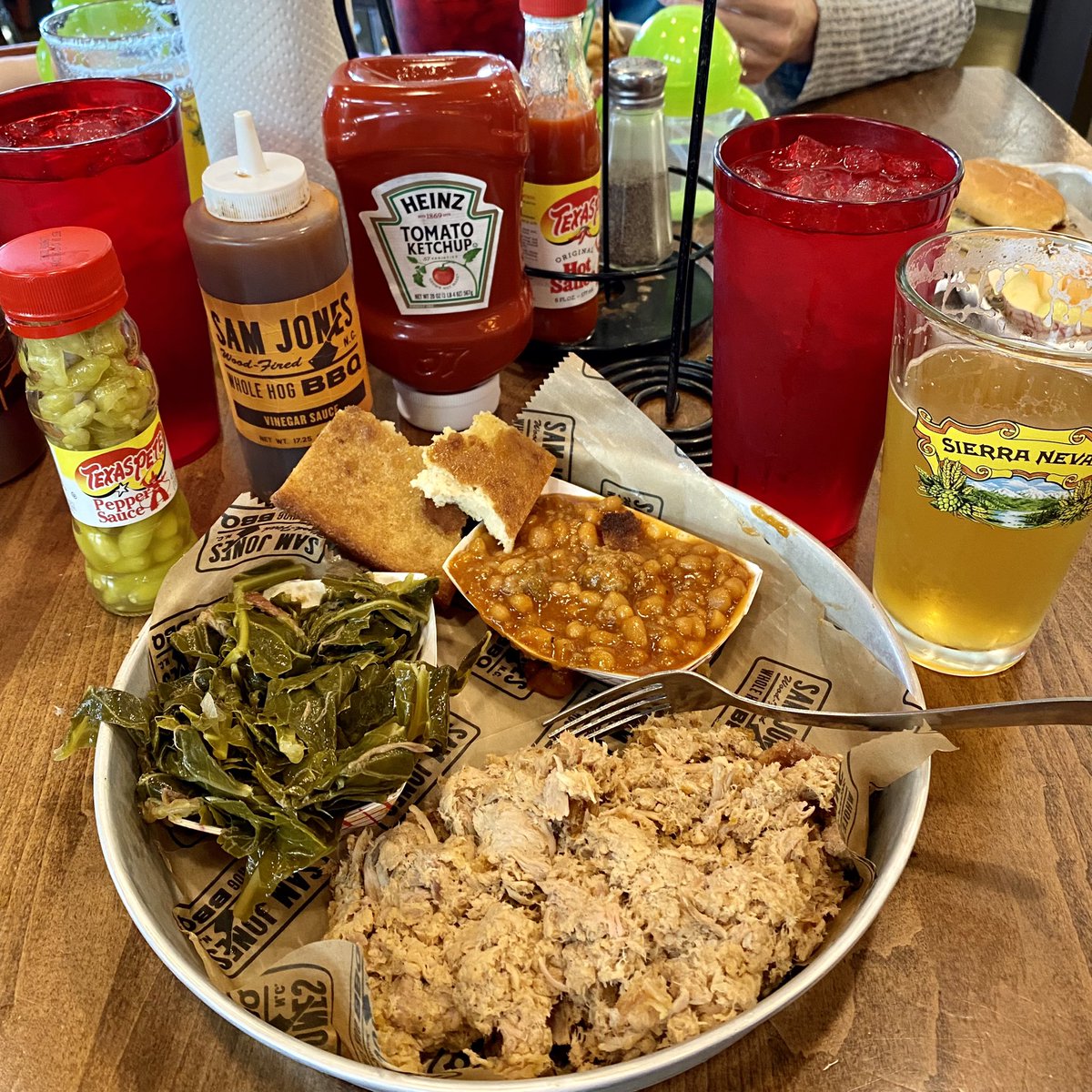 CMoneyKS's tweet photo. Carolina Chopped BBQ w/Collards, Beans and and Skyline original Cornbread. Pitt St Sam Jones Whole Hop Hazy IPA. ‘Nana Puddin’ for dessert. #CarolinaBBQ #WholeHotBBQ #NanaPuddin #IPA #EatLocal #DrinkLocal #SamJonesBBQ #GreenvilleNC #GrandpaLife https://t.co/y3QZzZsC4c