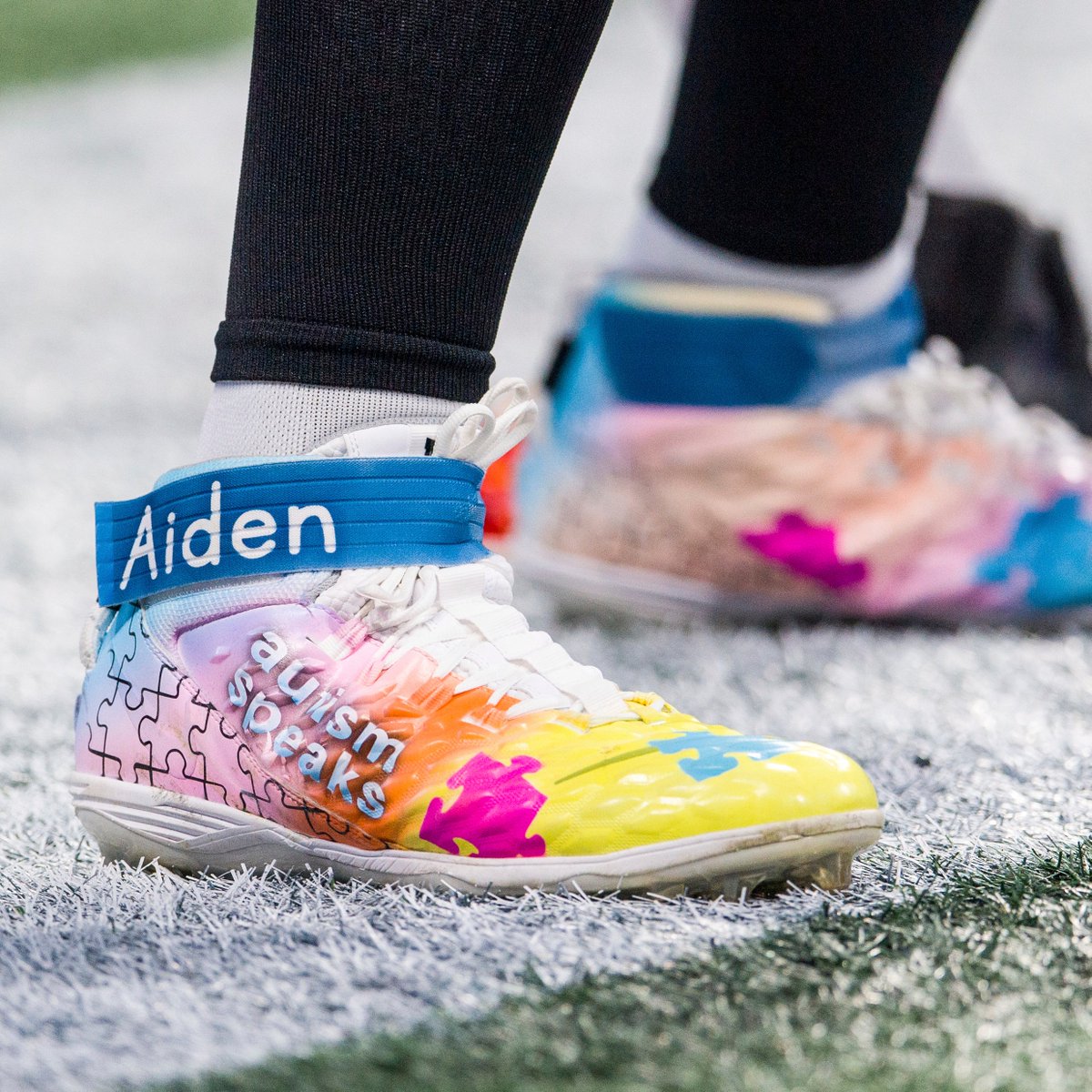 NFL's tweet photo. In honor of #WorldAutismDay, we're sharing some of our favorite #MyCauseMyCleats from the 2021 season. Today is about celebrating these diverse stories, and promoting greater awareness and understanding around autism. https://t.co/Pyo0yxU7VA