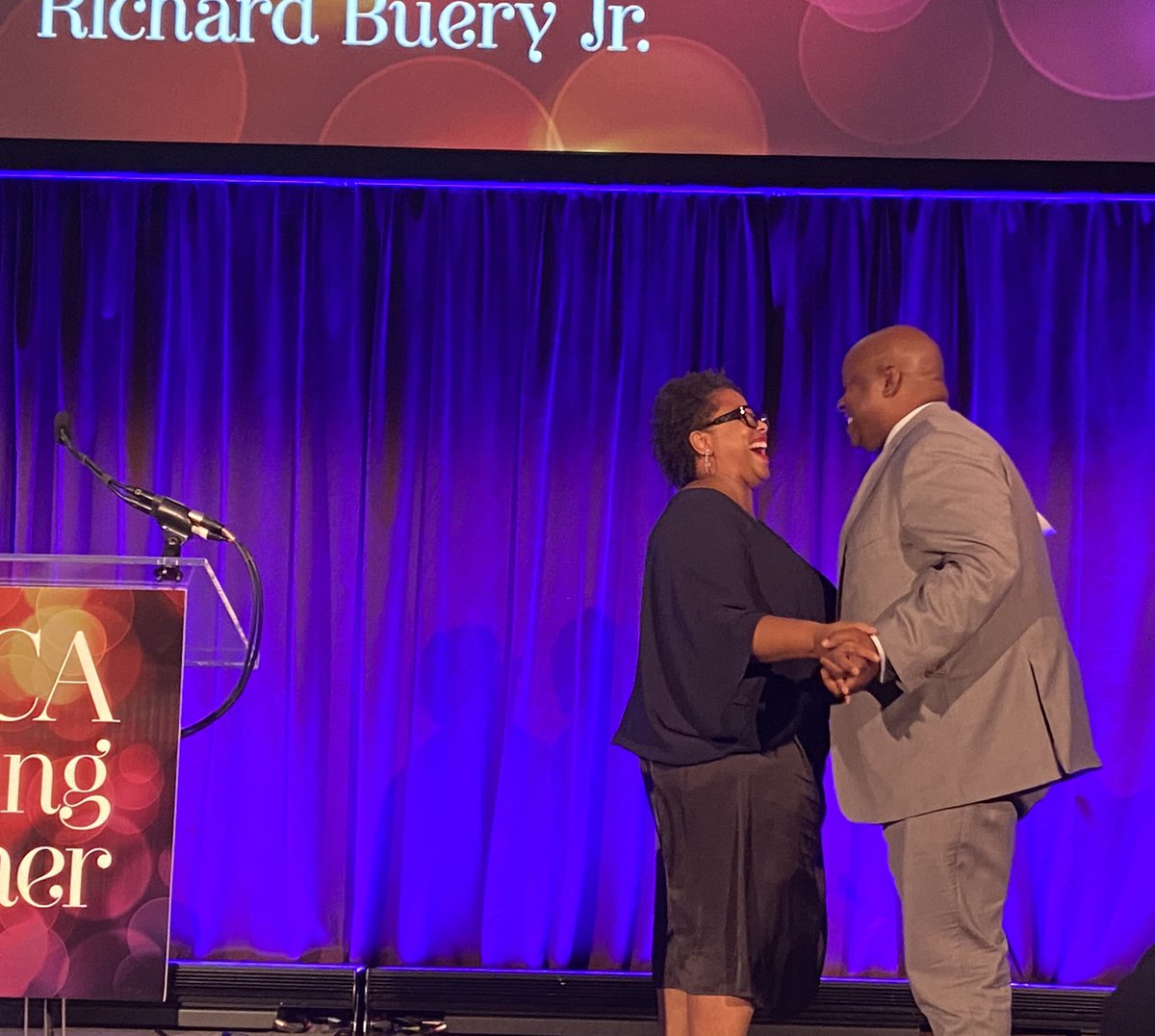 nyuLACA's tweet photo. @nyulaw’s own @DeborahNArcher introducing keynote speaker @RobinHoodNYC’s CEO @RichardBuery. This was a beautiful example of what it means to work for justice together. #LiftAsWeClimb #NYULacaSpringDinner. https://t.co/d945zovcrI