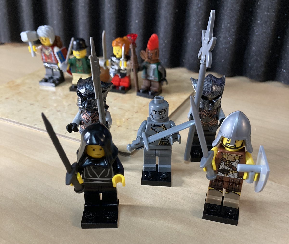 The A'téam stand behind a formidable group of villains