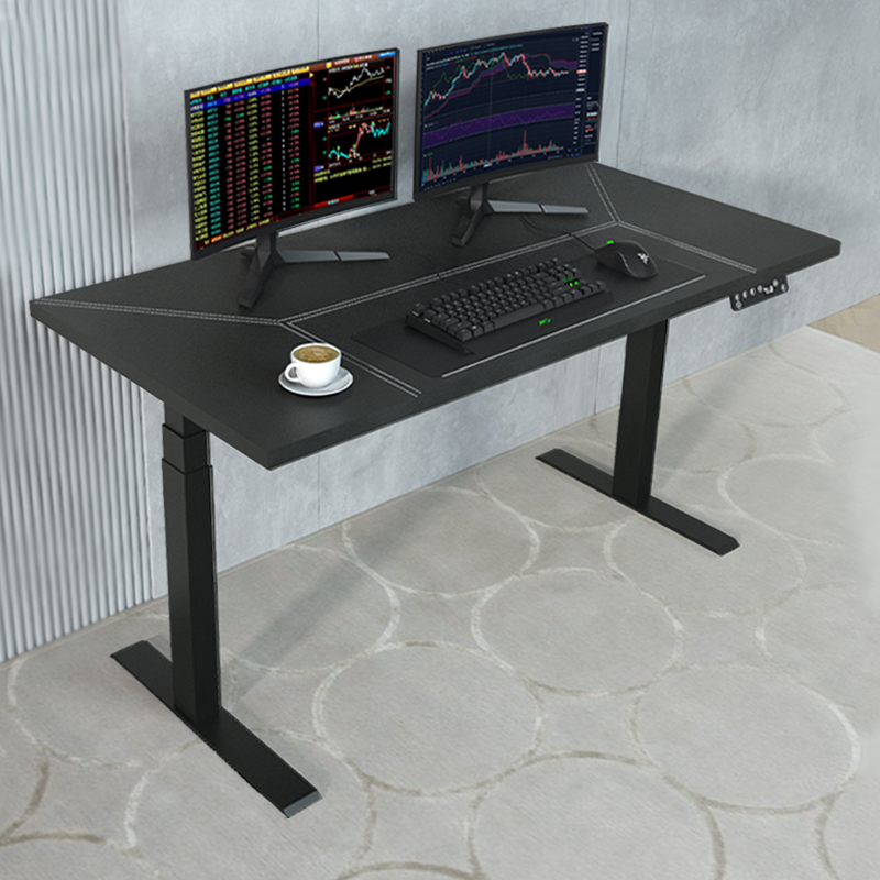 Electric adjustable desk in black color.